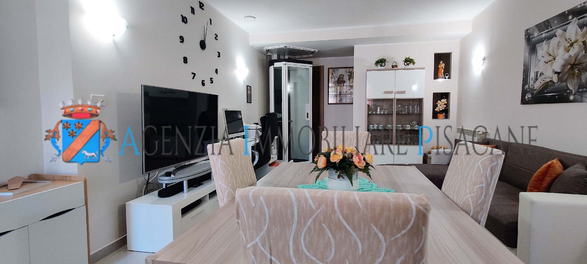 Sala con camino - Agenzia Immobiliare & Architettura Pisacane