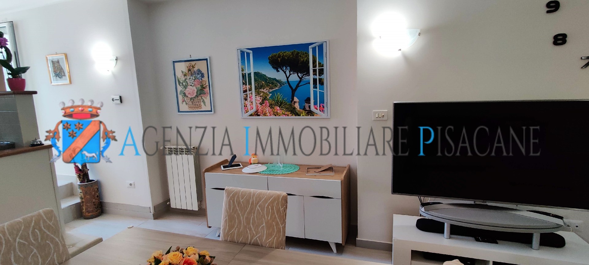Sala con camino - Agenzia Immobiliare & Architettura Pisacane