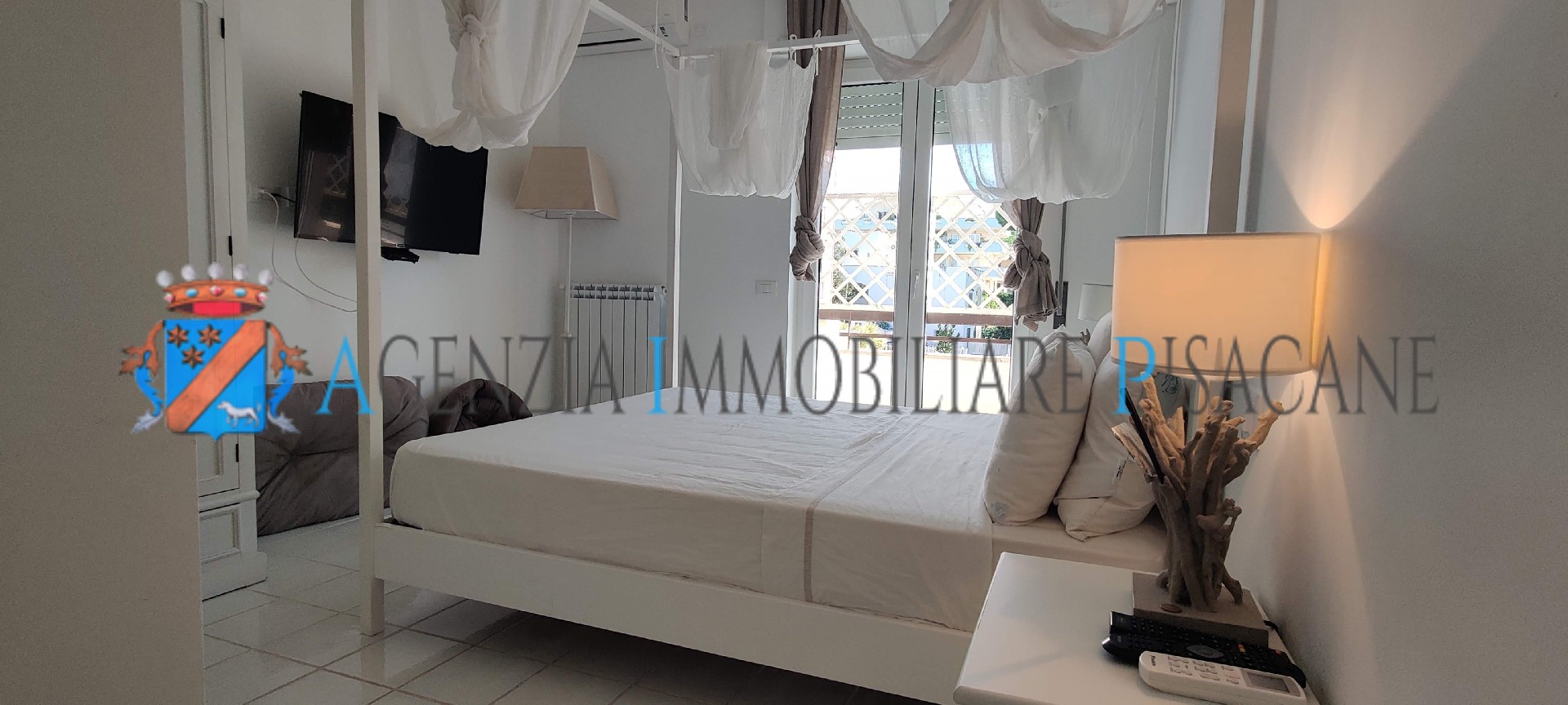 Camera matrimoniale con bagno - Agenzia Immobiliare & Architettura Pisacane