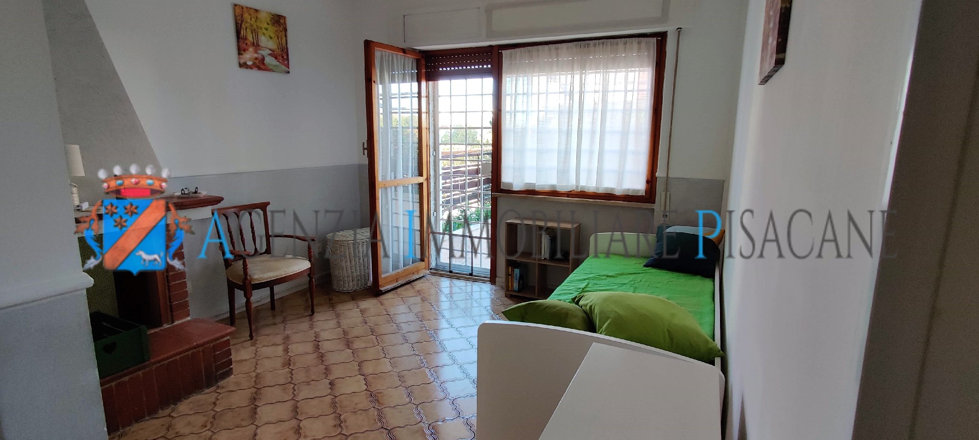 Sala con camino - Agenzia Immobiliare & Architettura Pisacane