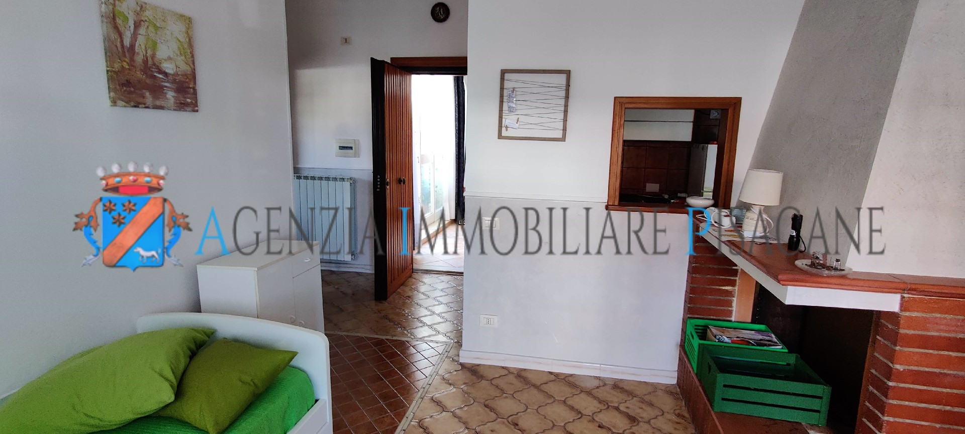 Sala con camino - Agenzia Immobiliare & Architettura Pisacane