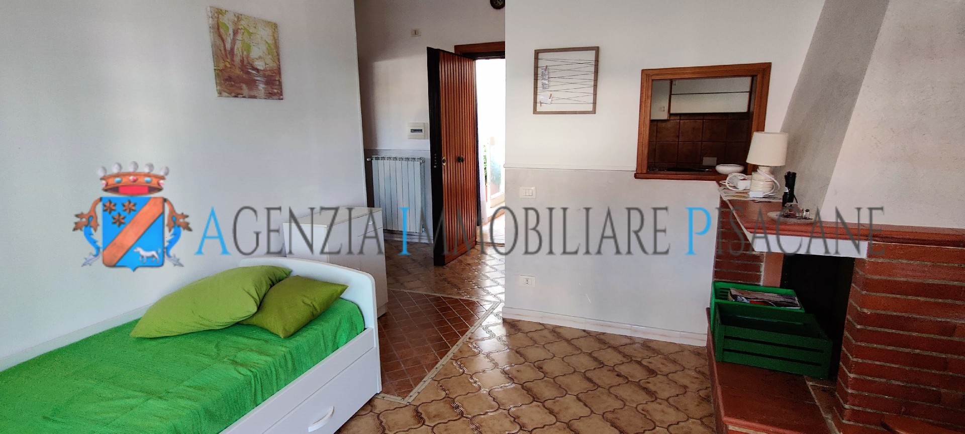 Sala con camino - Agenzia Immobiliare & Architettura Pisacane